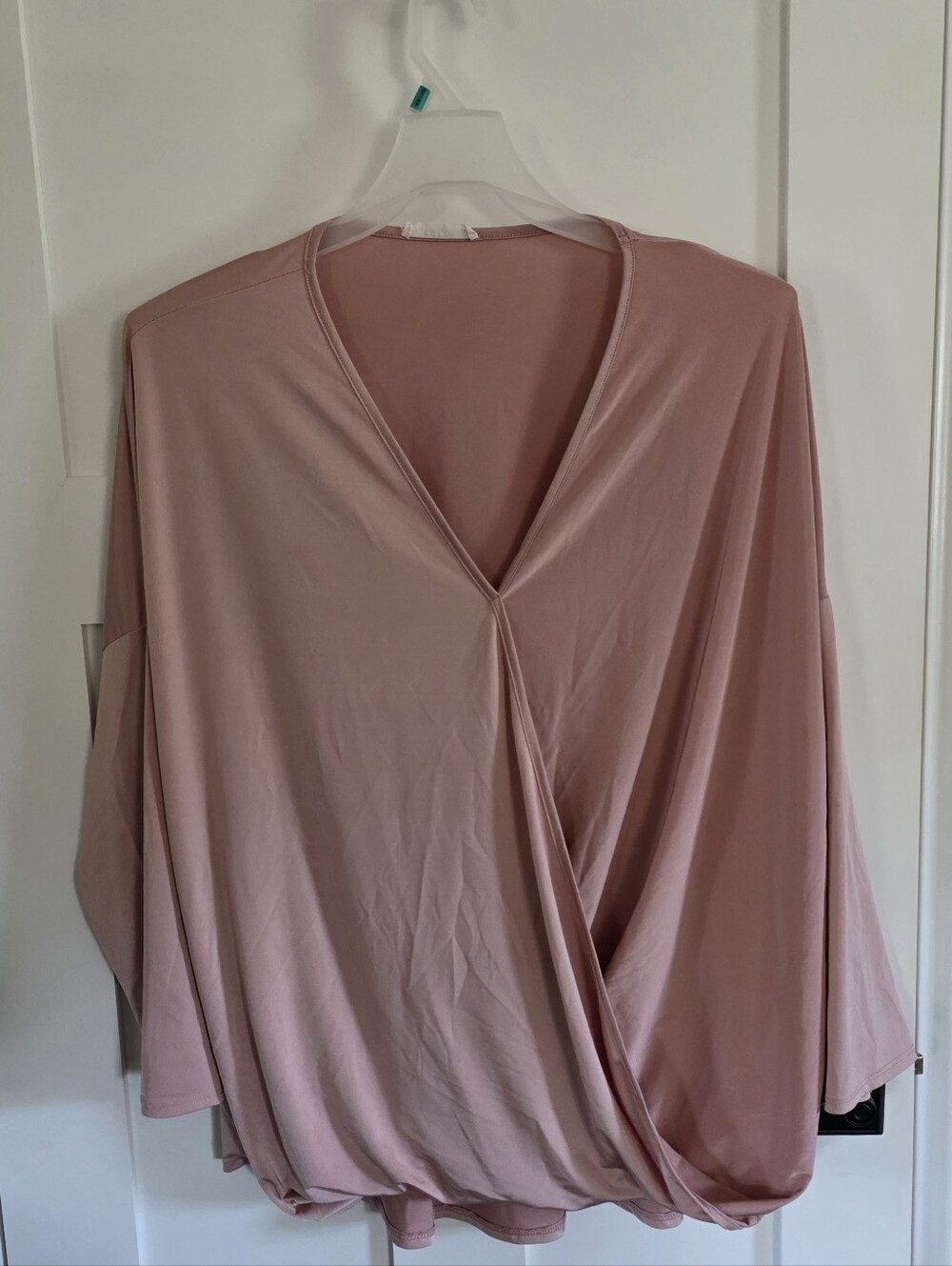 Entro- blush pink surplice drape top with a relaxed, batwing silhouette